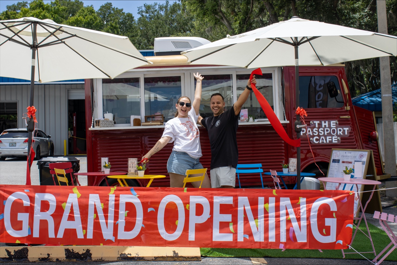 The owners celebrating at the truck's grand opening
